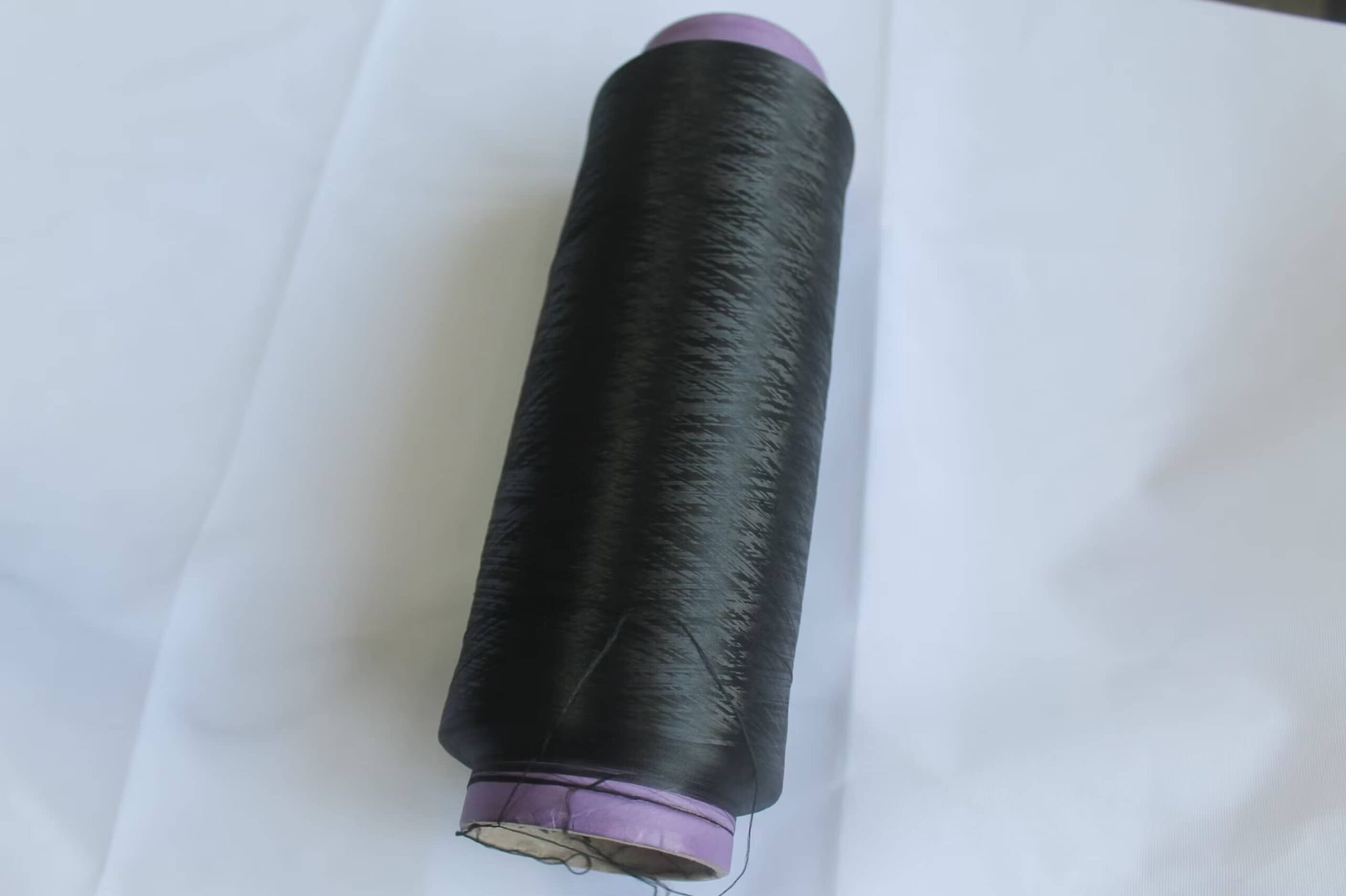 soi-polyester-draw-texturing-yarn-den-soi-polyester-DTY-Yarn-black-soi-dty-den